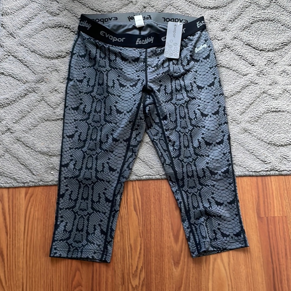 - New! Never worn Eastbay Evapor leggings.